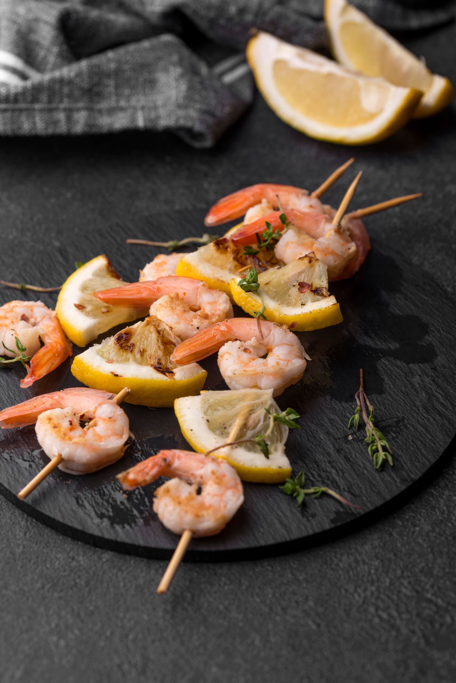 seafood-shrimp-skewers-blurred-lemon-slices.jpg